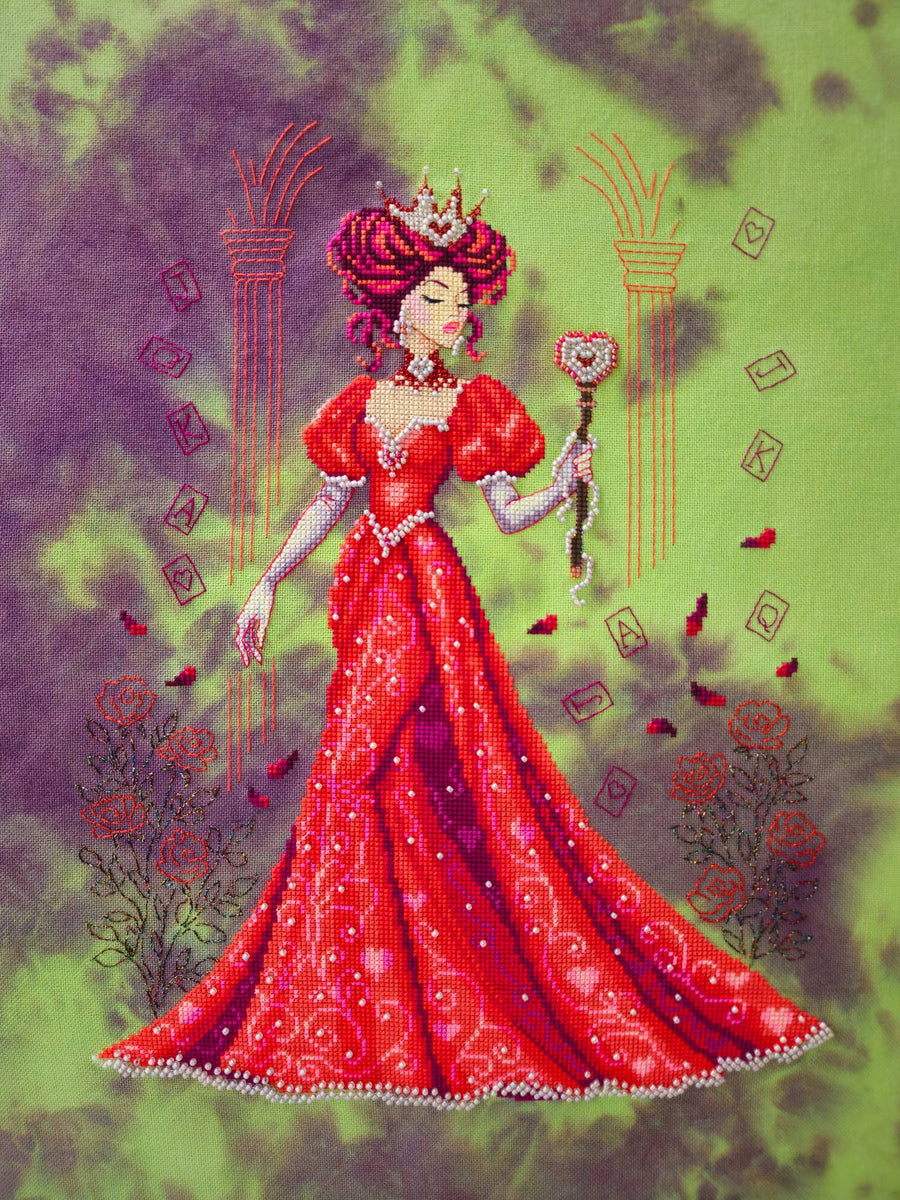 Finished Reina Queen of Hearts cross stitch in red gown with crown, cards and roses