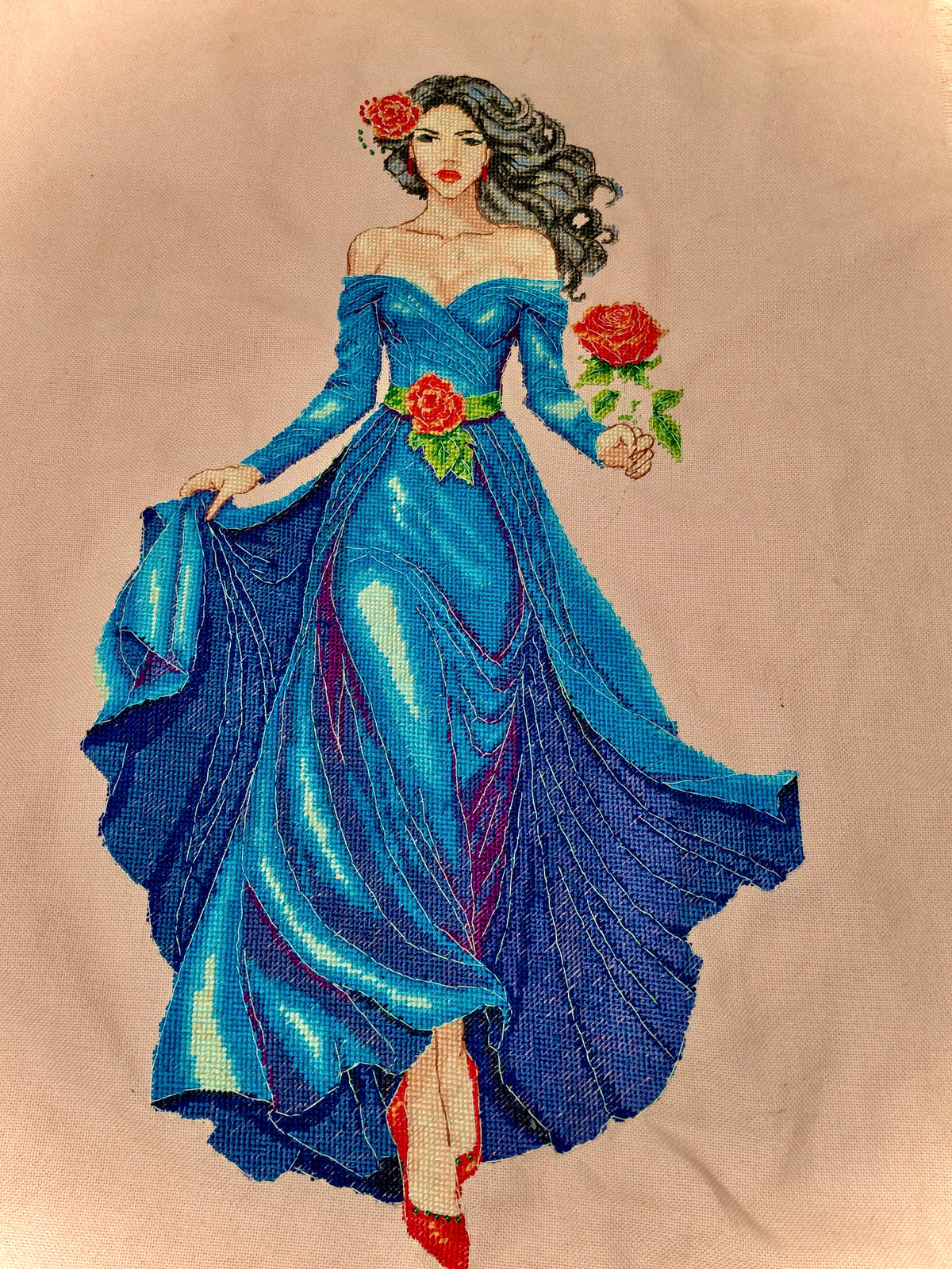 Close-up of blue bead and thread details